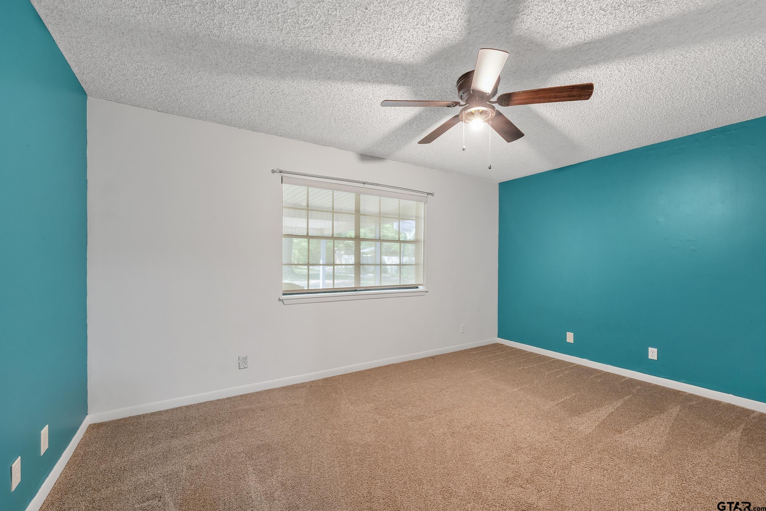 150 Rodney Hawkins, TX 75765 - Photo 20 of 36 an empty room with windows and fan