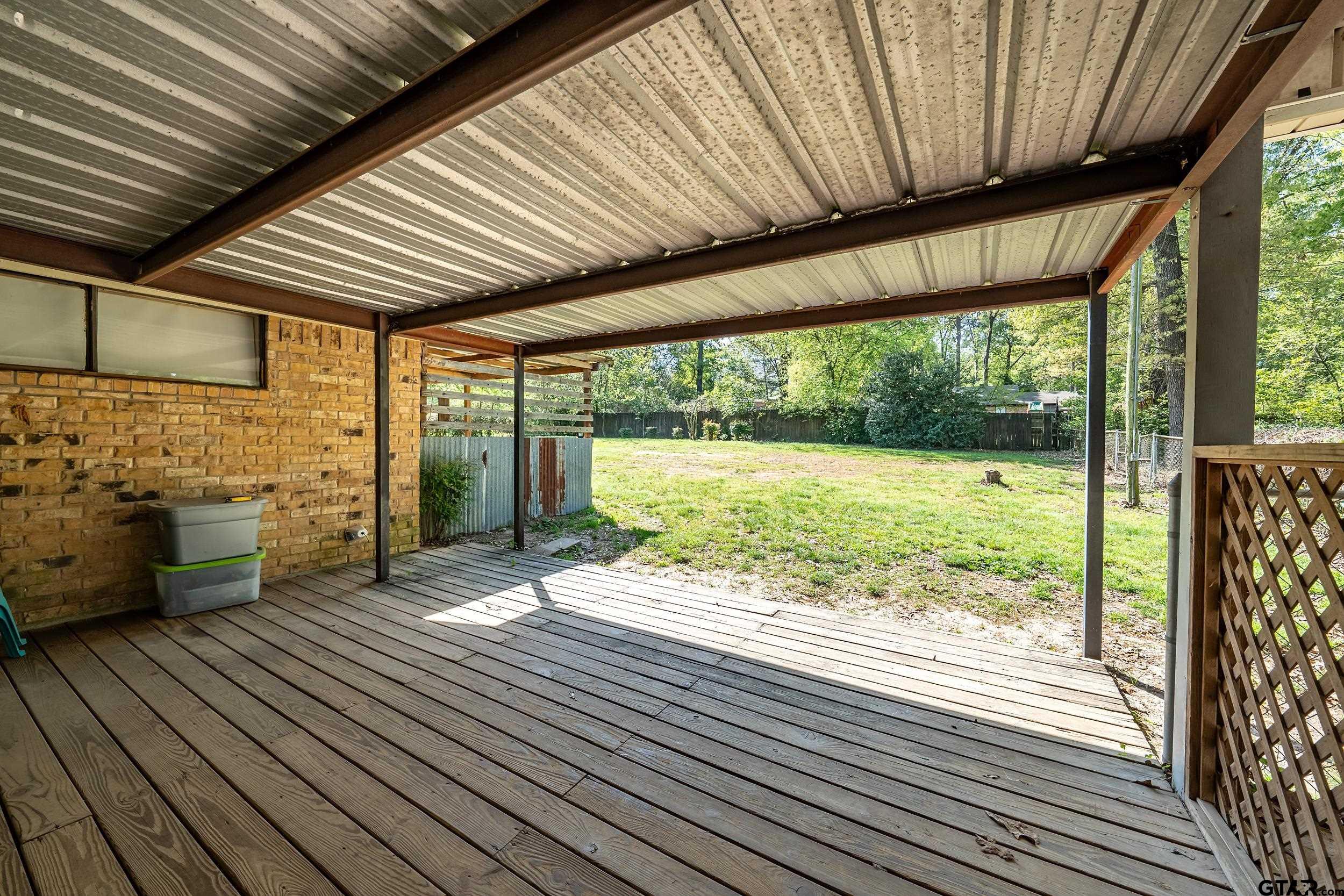 150 Rodney Hawkins, TX 75765 - Photo 31 of 36 a view of a porch with wooden floor