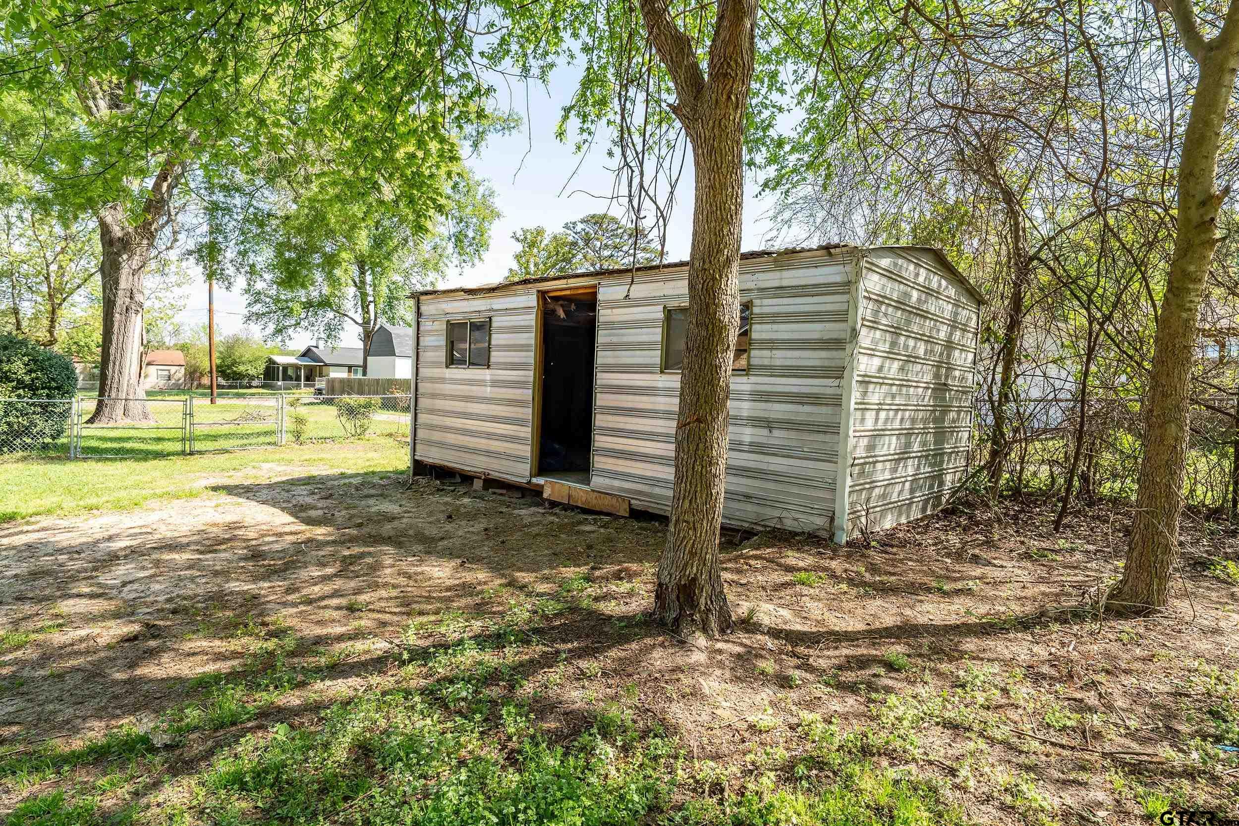 150 Rodney Hawkins, TX 75765 - Photo 32 of 36 a view of a house with a yard