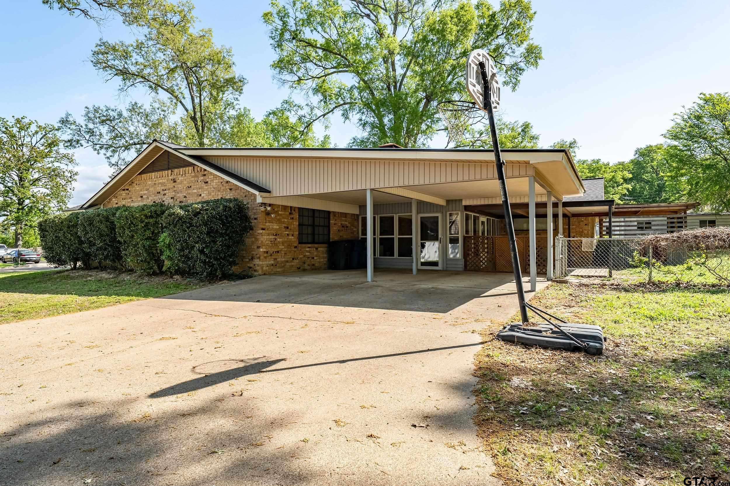 150 Rodney Hawkins, TX 75765 - Photo 35 of 36 a house with trees in the background