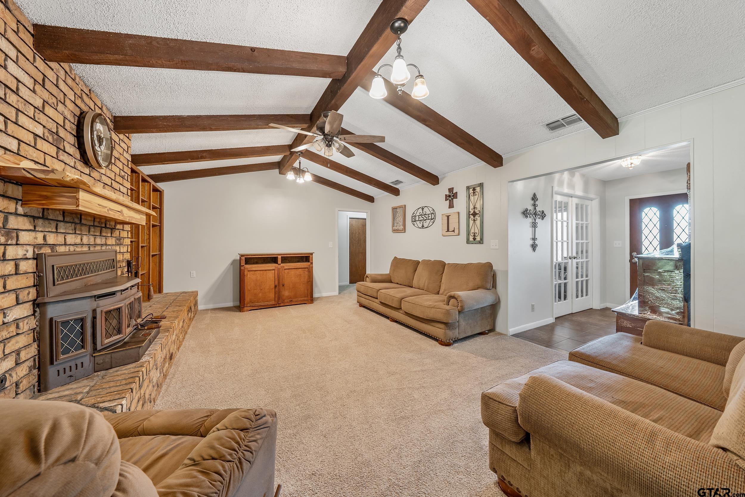 150 Rodney Hawkins, TX 75765 - Photo 7 of 36 a bedroom with furniture and a couch