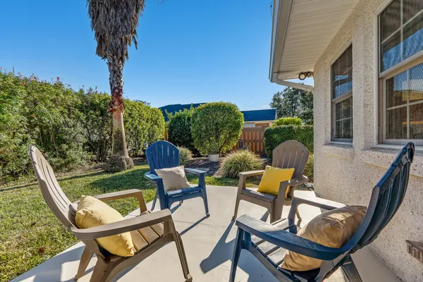 a view of a livingroom with furniture and a chair
