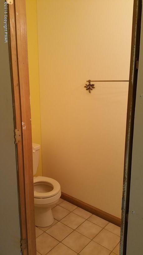 175 Devils Hole Road Cresco, PA 18326 - Photo 11 of 21 a bathroom with a white toilet and sink