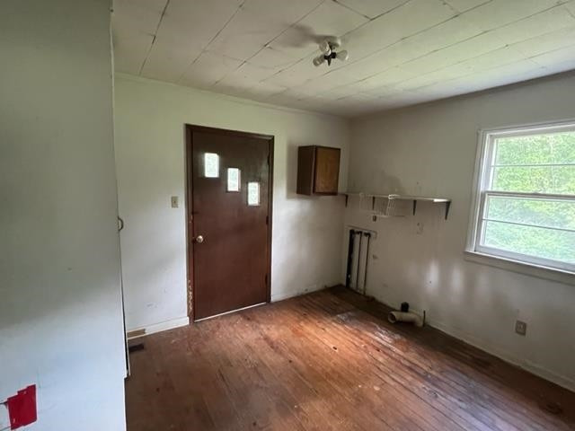 10129 Boyce Road Creedmoor, NC 27522 - Photo 12 of 12 a view of empty room with wooden floor and fan