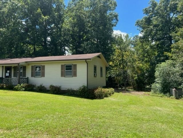 10129 Boyce Road Creedmoor, NC 27522 - Photo 2 of 12 a view of a house with backyard and garden