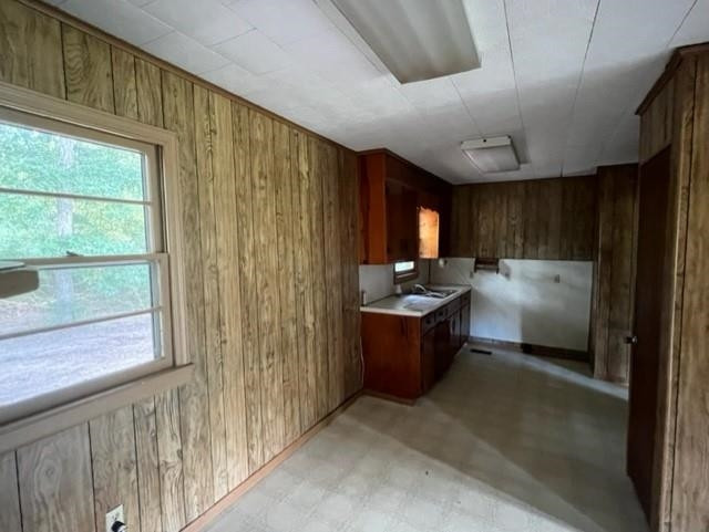 10129 Boyce Road Creedmoor, NC 27522 - Photo 8 of 12 a kitchen with a refrigerator a sink and a window