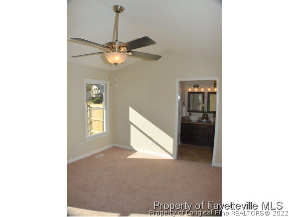 966 Rim Road Fayetteville, NC 28314 - Photo 11 of 18 a view of an empty room with a window
