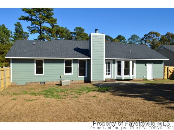 966 Rim Road Fayetteville, NC 28314 - Photo 17 of 18 a house view with a garden space