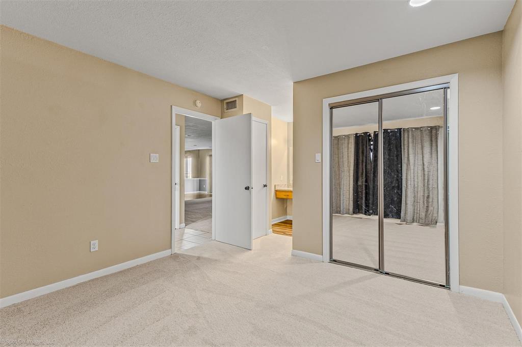 925 Signal Ridge Place Rockwall, TX 75032 - Photo 13 of 21 wooden floor and closet in a room