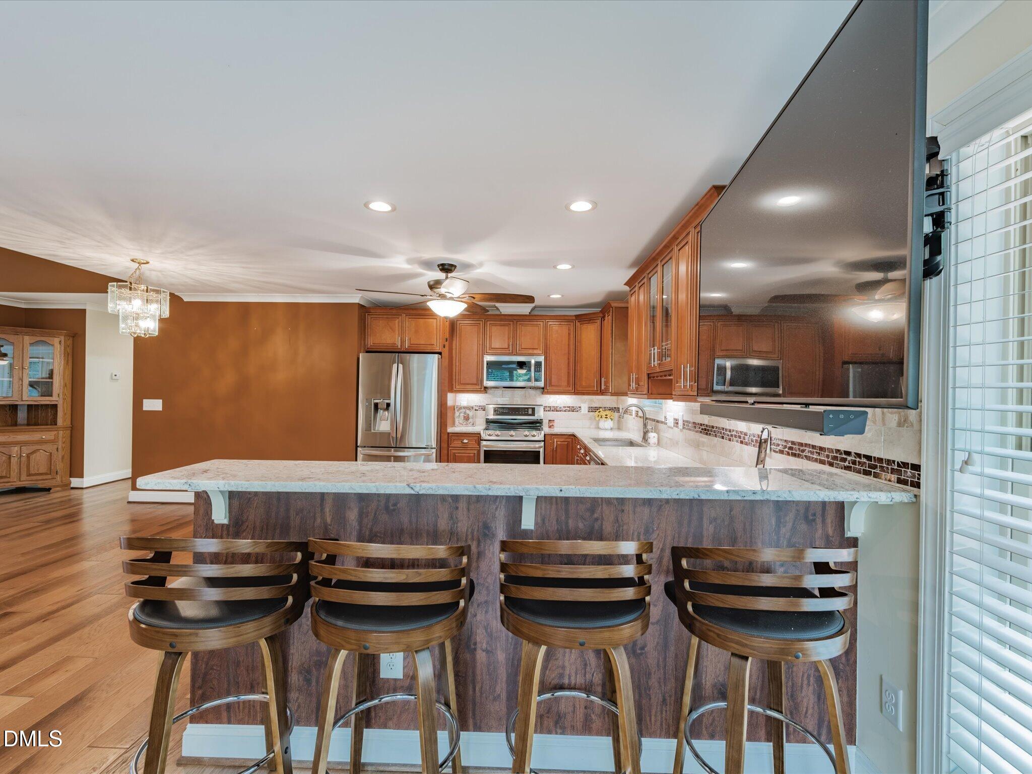 4532 Johnson Pond Road Apex, NC 27539 - Photo 18 of 50 18-Kitchen Bar