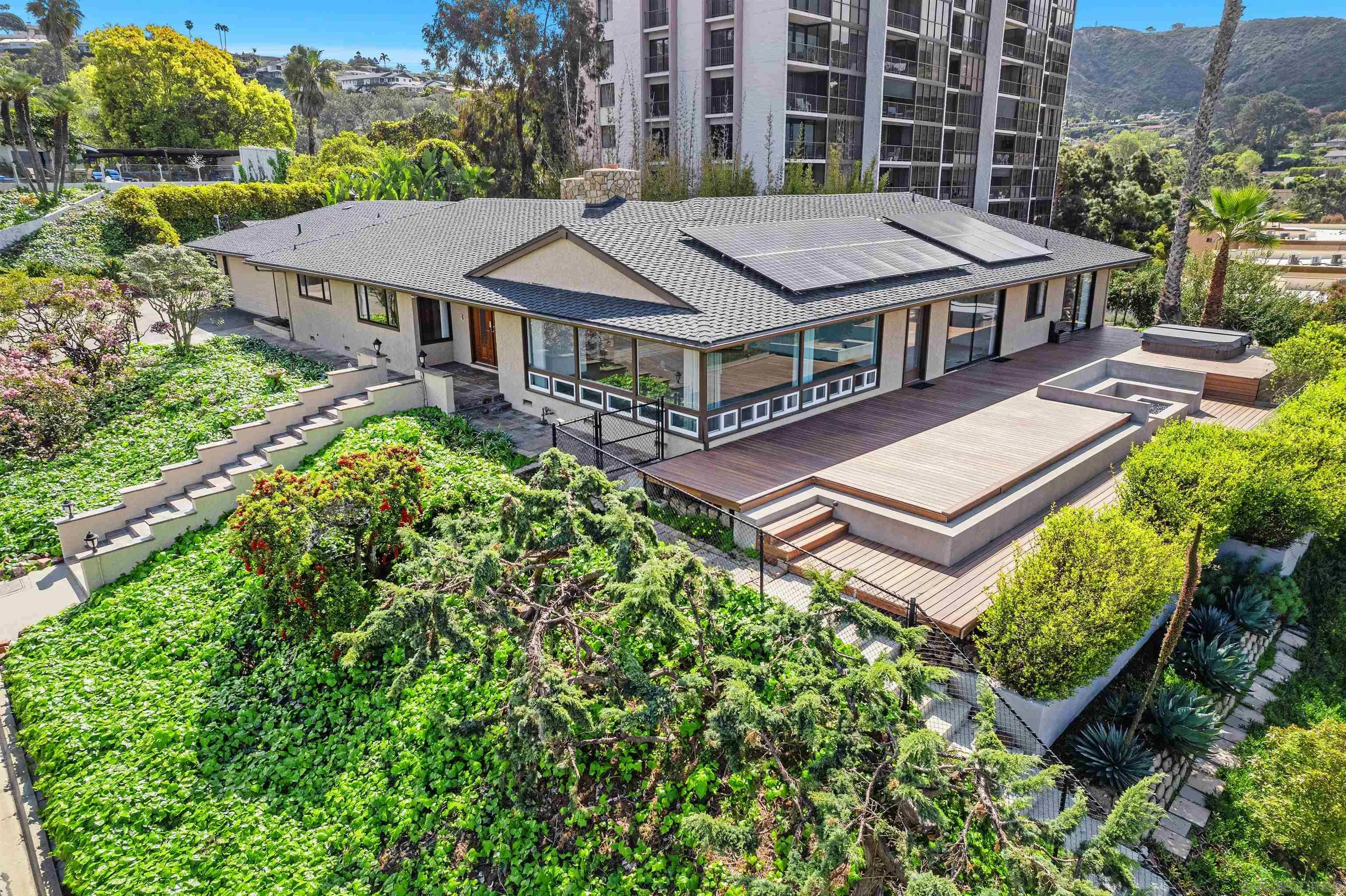2435 Paseo Dorado La Jolla, CA 92037 - Photo 28 of 40 an aerial view of a residential apartment building with a yard