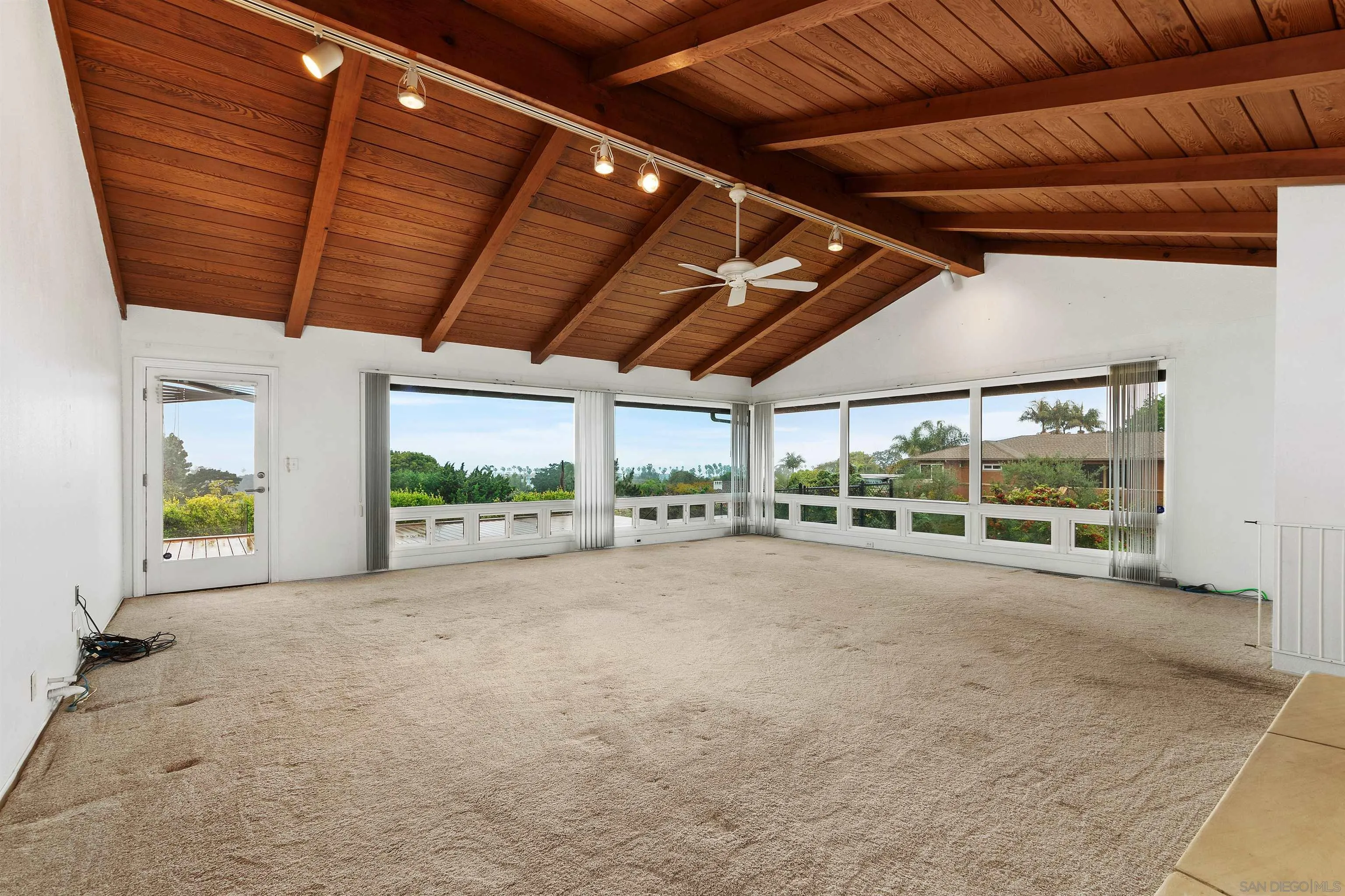 2435 Paseo Dorado La Jolla, CA 92037 - Photo 6 of 40 a view of an empty room with a sliding door