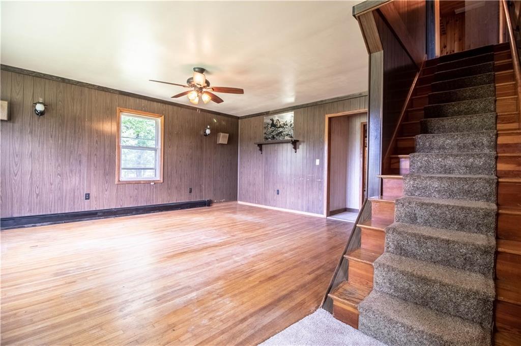 106 Robinson Hill Road Sebago, ME 04029 - Photo 20 of 34 Living room, with beautiful wood floors