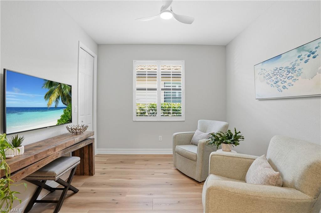3058 Aviamar Circle Naples, FL 34114 - Photo 15 of 50 Light wood-finish flooring complements the neutral wall tones