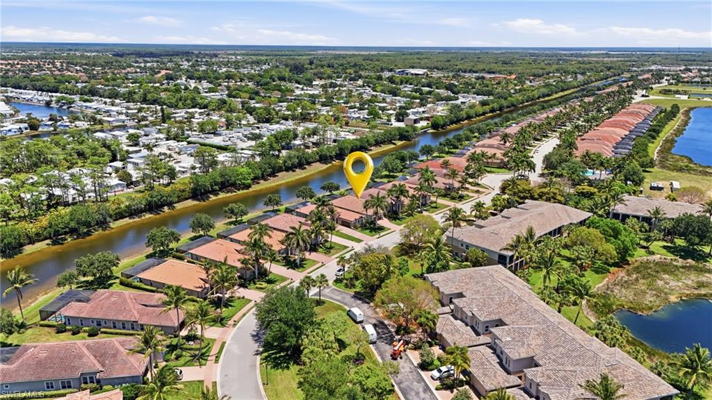 3058 Aviamar Circle Naples, FL 34114 - Photo 33 of 50 Aerial perspective showcasing a residential community with abundant green spaces