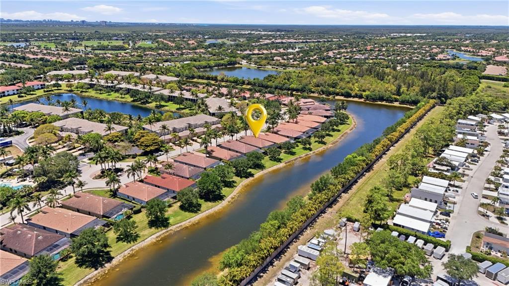 3058 Aviamar Circle Naples, FL 34114 - Photo 38 of 50 Aerial perspective highlighting a waterfront community with direct canal access