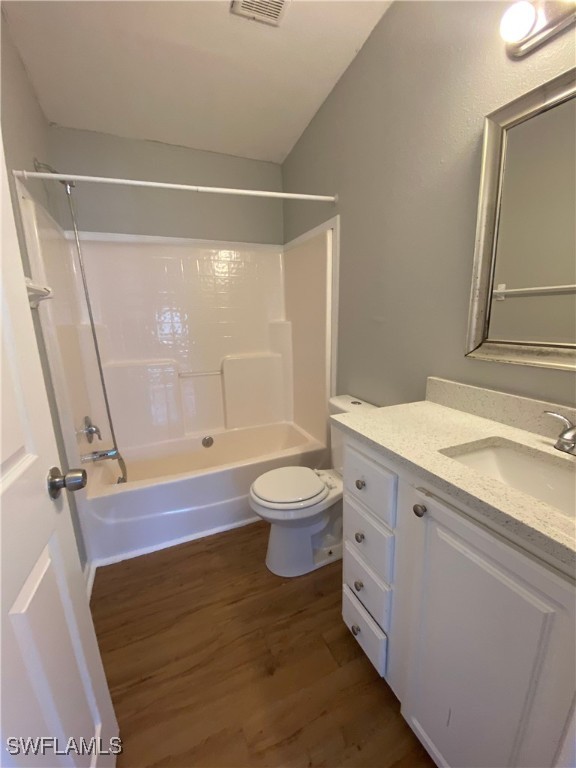 5527 Judith Road Bokeelia, FL 33922 - Photo 10 of 13 a bathroom with a granite countertop sink toilet a mirror and shower