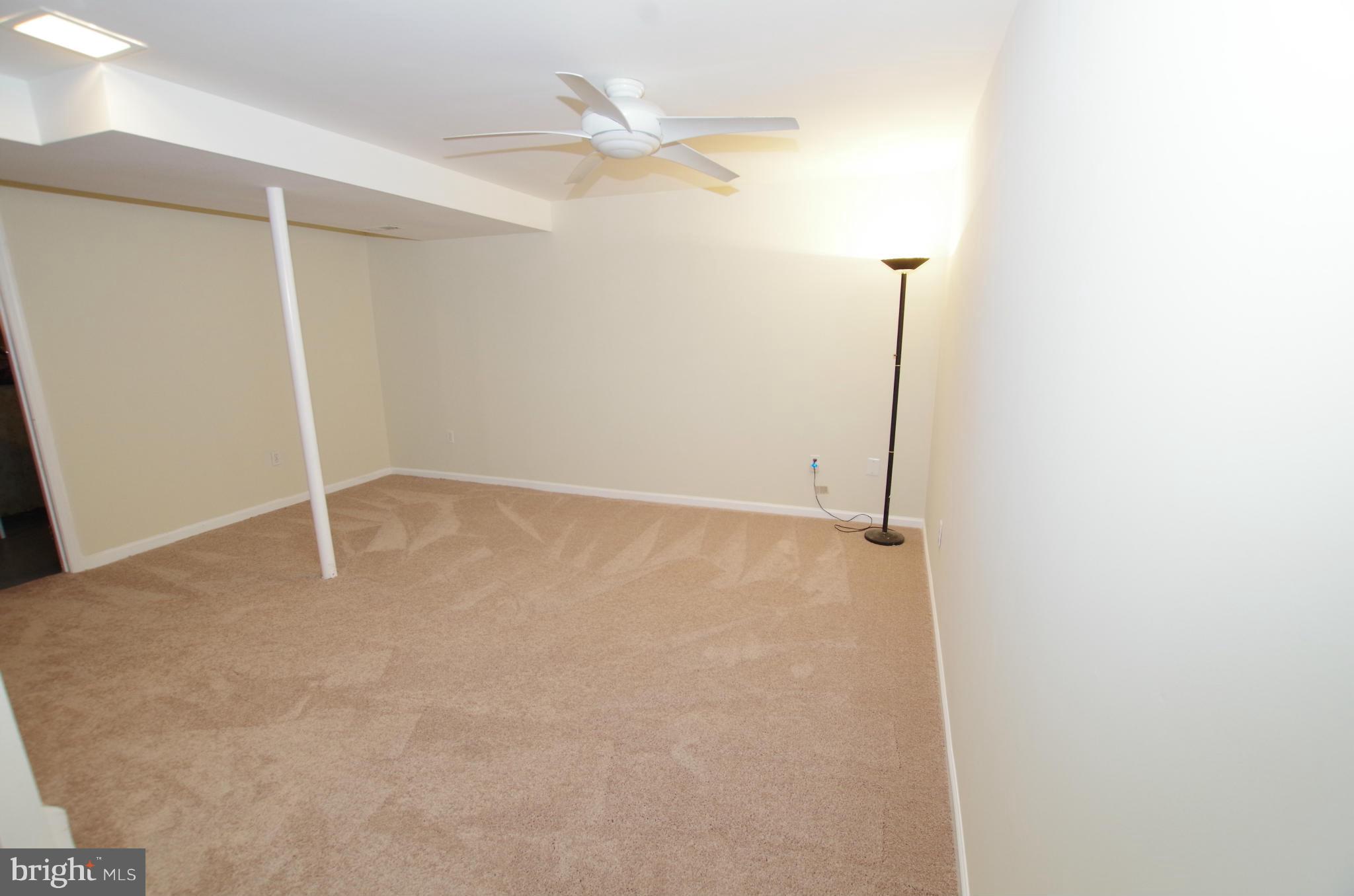 7312 Torran Rocks Way Gaithersburg, MD 20879 - Photo 18 of 30 Recreation Room with Ceiling Fan