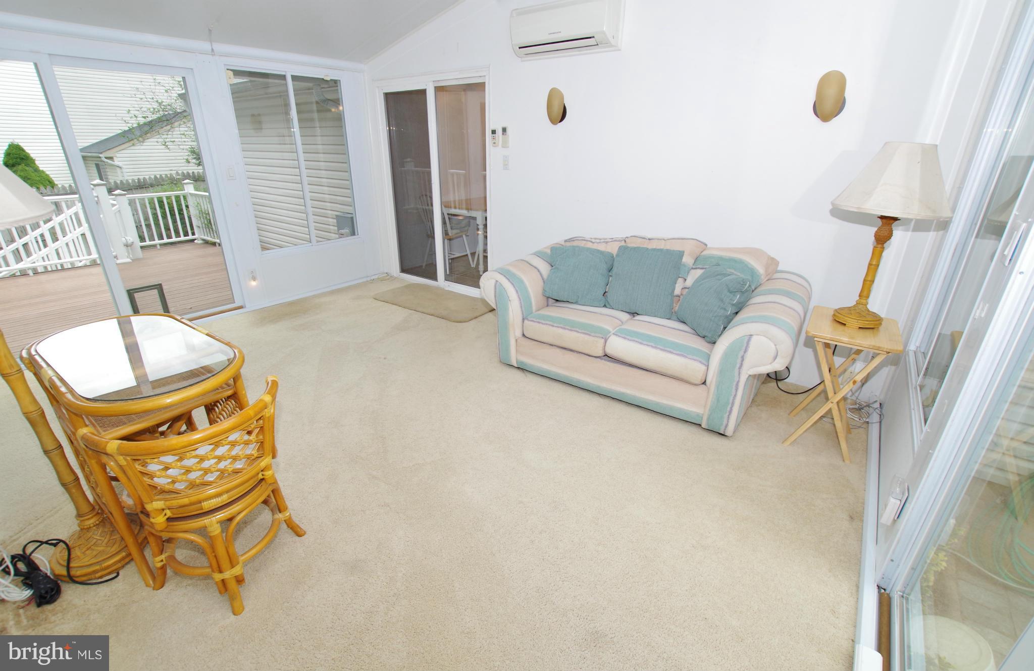 7312 Torran Rocks Way Gaithersburg, MD 20879 - Photo 21 of 30 Sunroom with Cathedral Ceiling