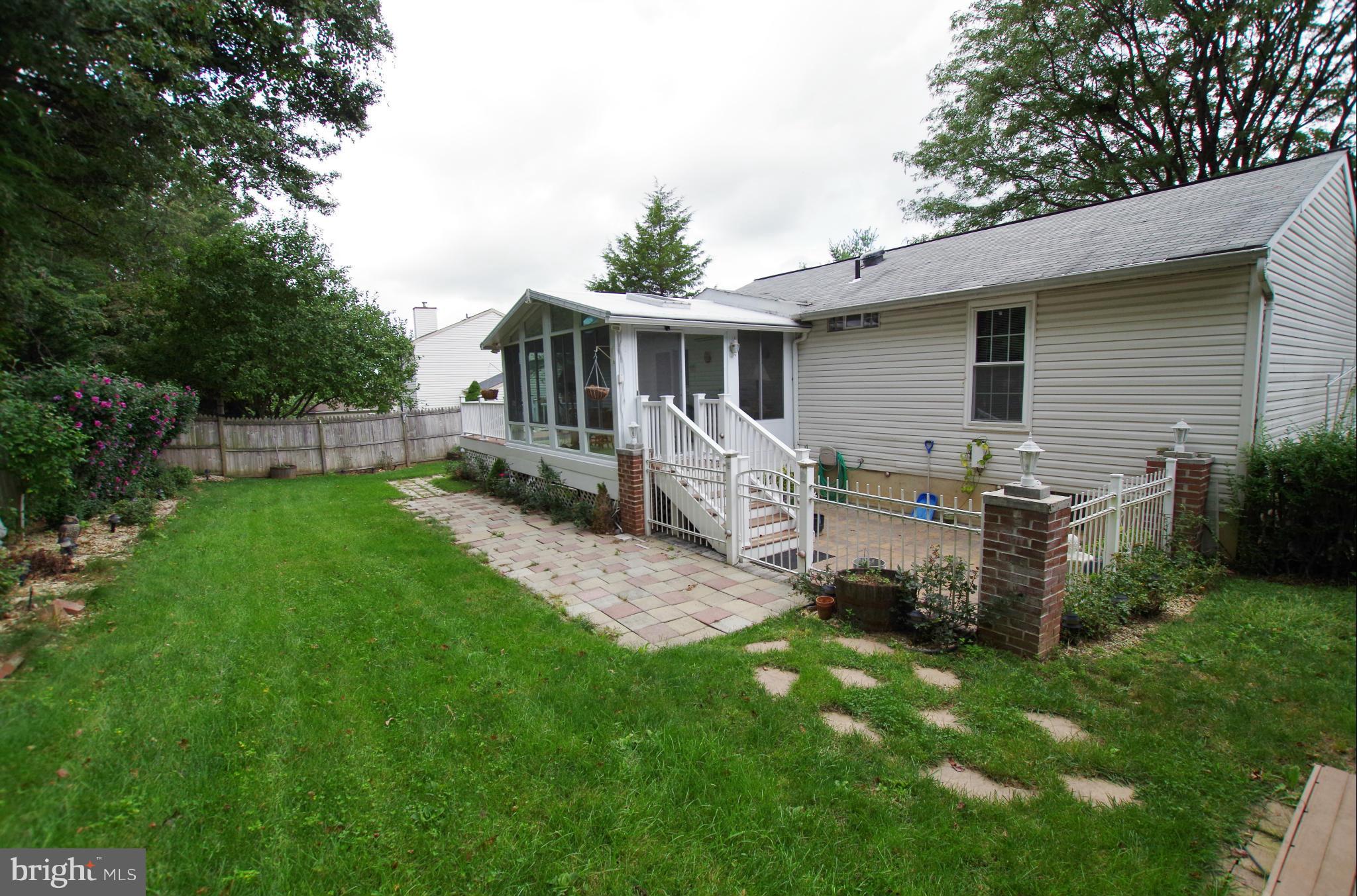 7312 Torran Rocks Way Gaithersburg, MD 20879 - Photo 25 of 30 View of Backyard Slate Patio