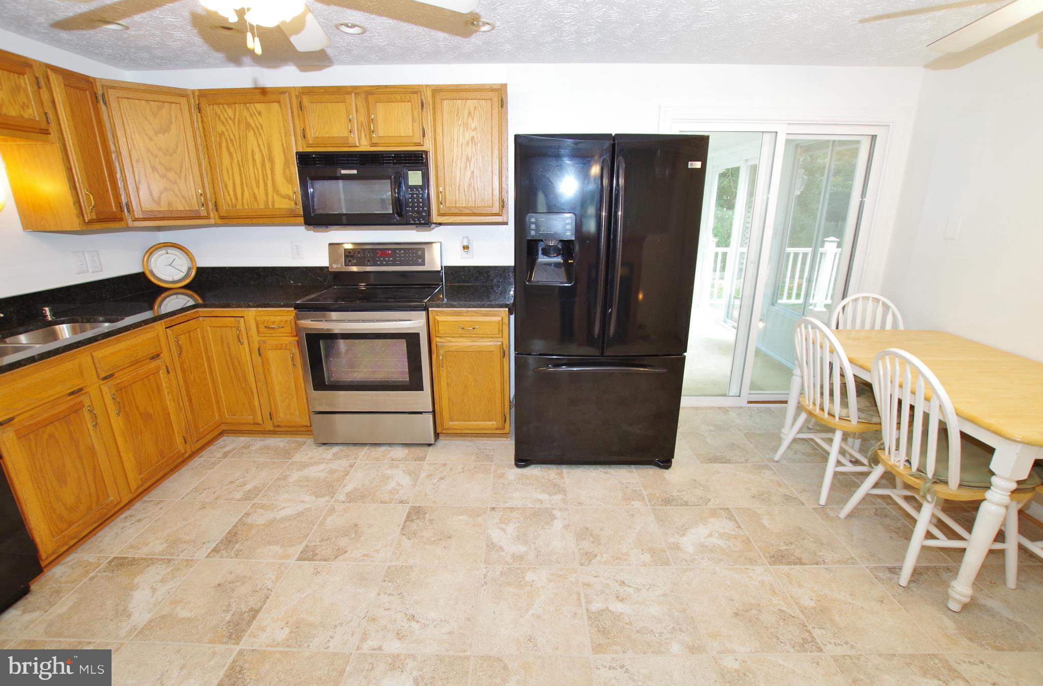 7312 Torran Rocks Way Gaithersburg, MD 20879 - Photo 9 of 30 Granite Countertop and Double Sink