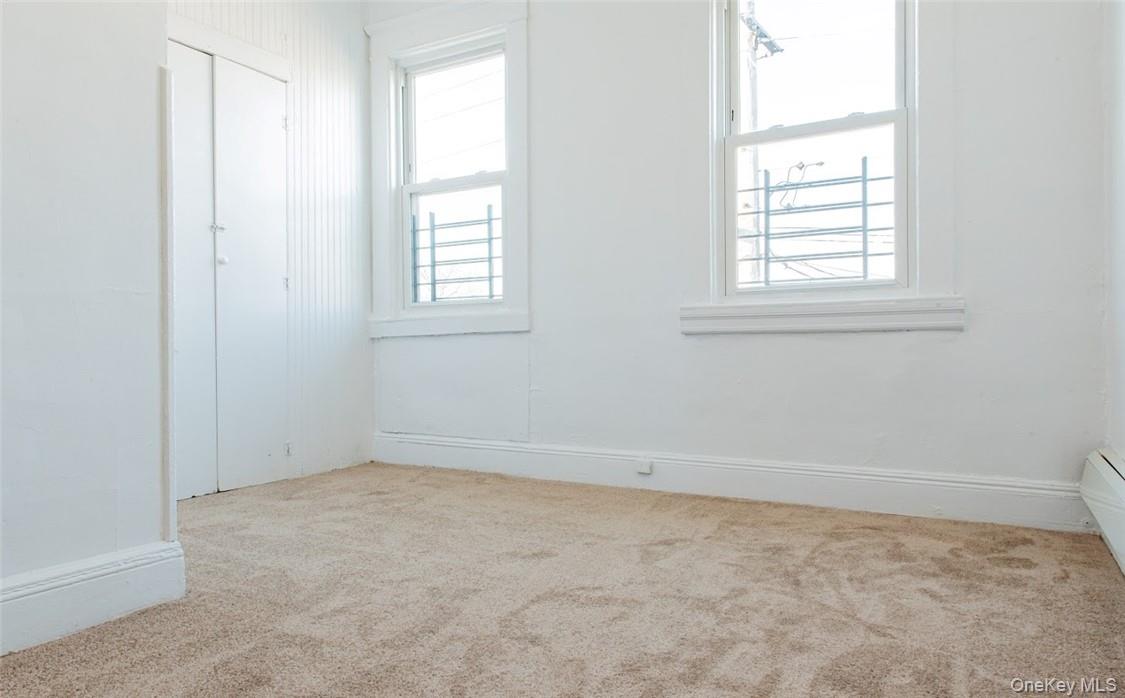 14 Horton Avenue New Rochelle, NY 10801 - Photo 19 of 29 an empty room with windows