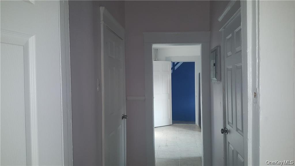 14 Horton Avenue New Rochelle, NY 10801 - Photo 24 of 29 a view of a bathroom from a hallway