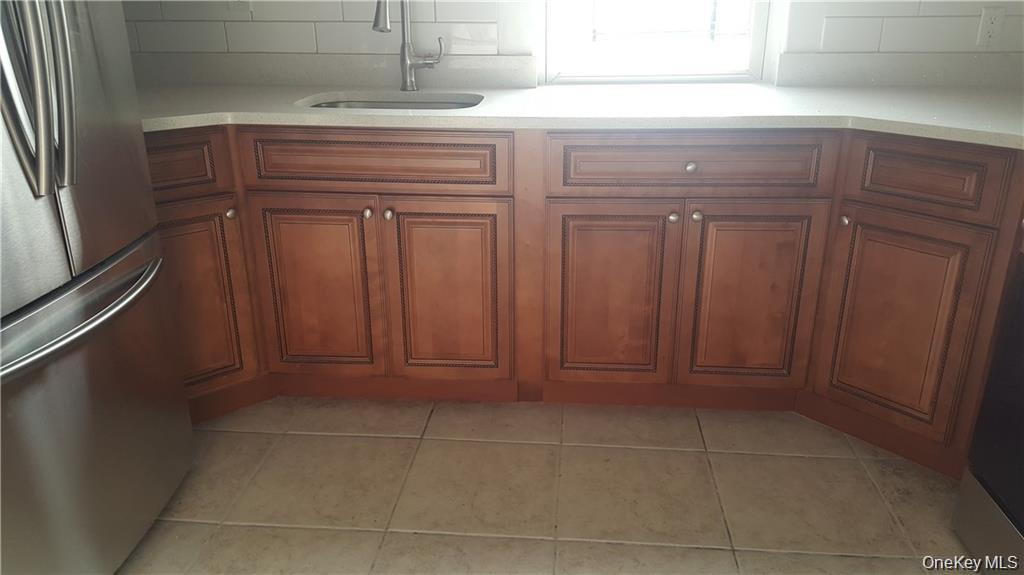 14 Horton Avenue New Rochelle, NY 10801 - Photo 3 of 29 a view of a utility room with dryer and washer