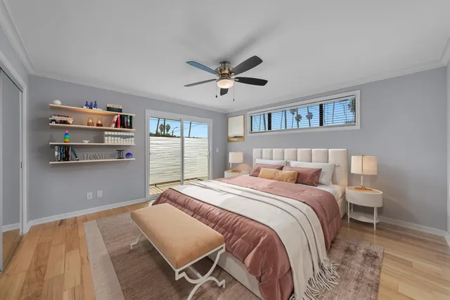 a living room with furniture a rug and a table