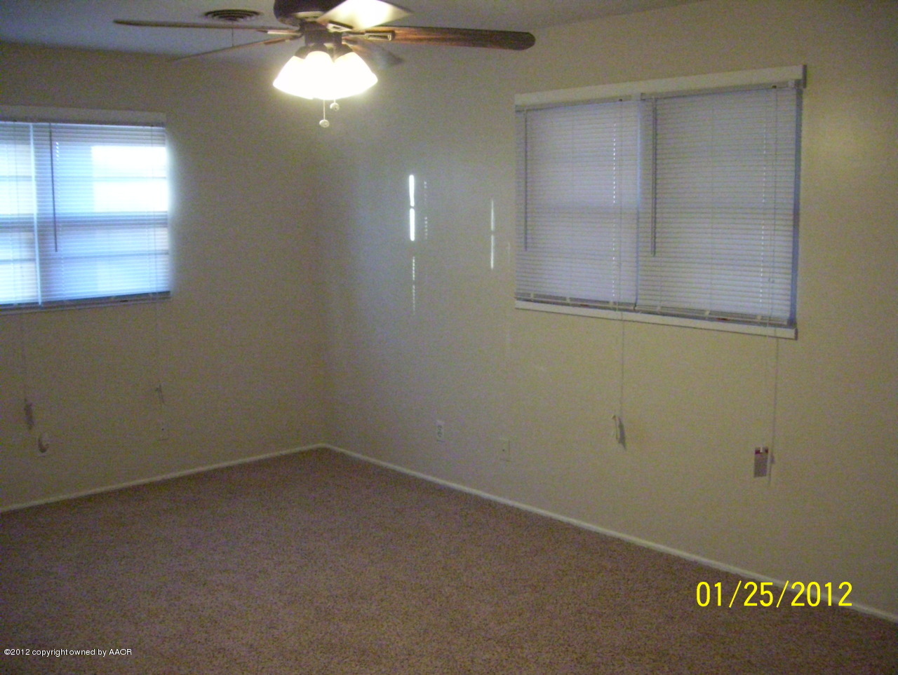 5019 Leigh Avenue Amarillo, TX 79110 - Photo 3 of 16 a view of empty room with window