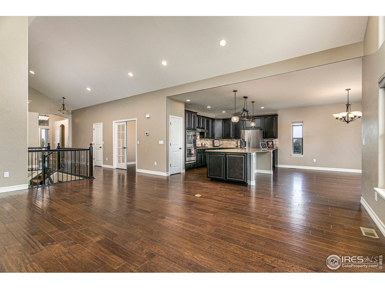 3202 Timeless Circle Berthoud, CO 80513 - Photo 11 of 40 a view of a living room kitchen with stainless steel appliances kitchen island