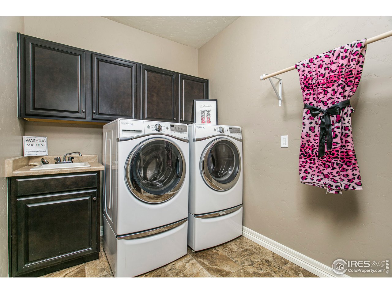 3202 Timeless Circle Berthoud, CO 80513 - Photo 18 of 40 a utility room with dryer and washer