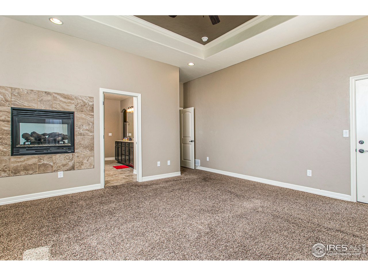 3202 Timeless Circle Berthoud, CO 80513 - Photo 20 of 40 a view of an empty room with a window