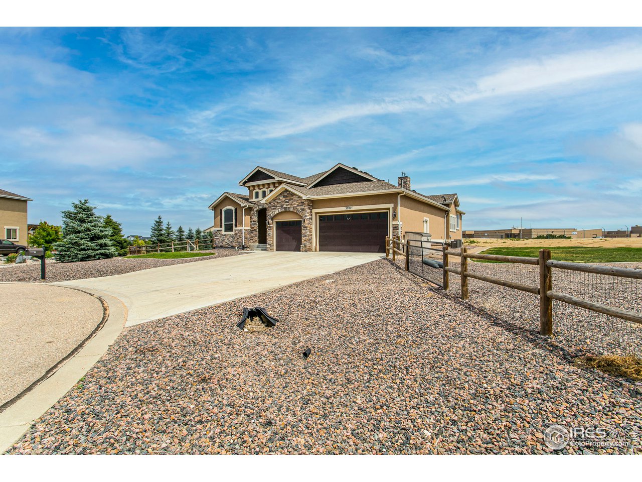 3202 Timeless Circle Berthoud, CO 80513 - Photo 2 of 40 a view of a terrace with a bench