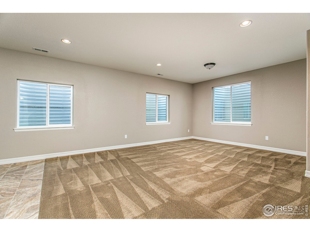 3202 Timeless Circle Berthoud, CO 80513 - Photo 26 of 40 a view of an empty room with a window