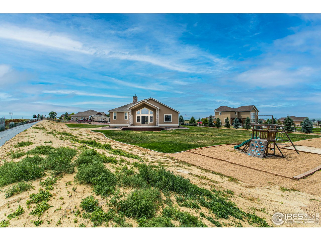 3202 Timeless Circle Berthoud, CO 80513 - Photo 35 of 40 a view of an house with a big yard
