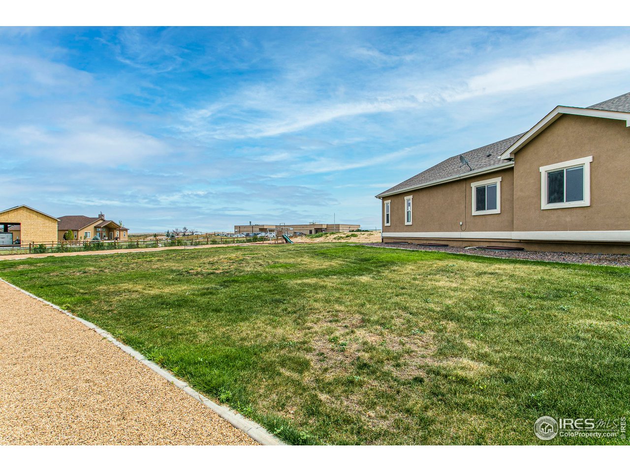 3202 Timeless Circle Berthoud, CO 80513 - Photo 38 of 40 a view of an house with backyard