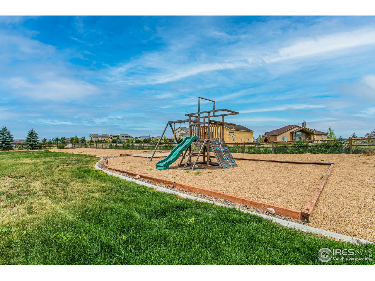 3202 Timeless Circle Berthoud, CO 80513 - Photo 39 of 40 a view of a lake with a big yard