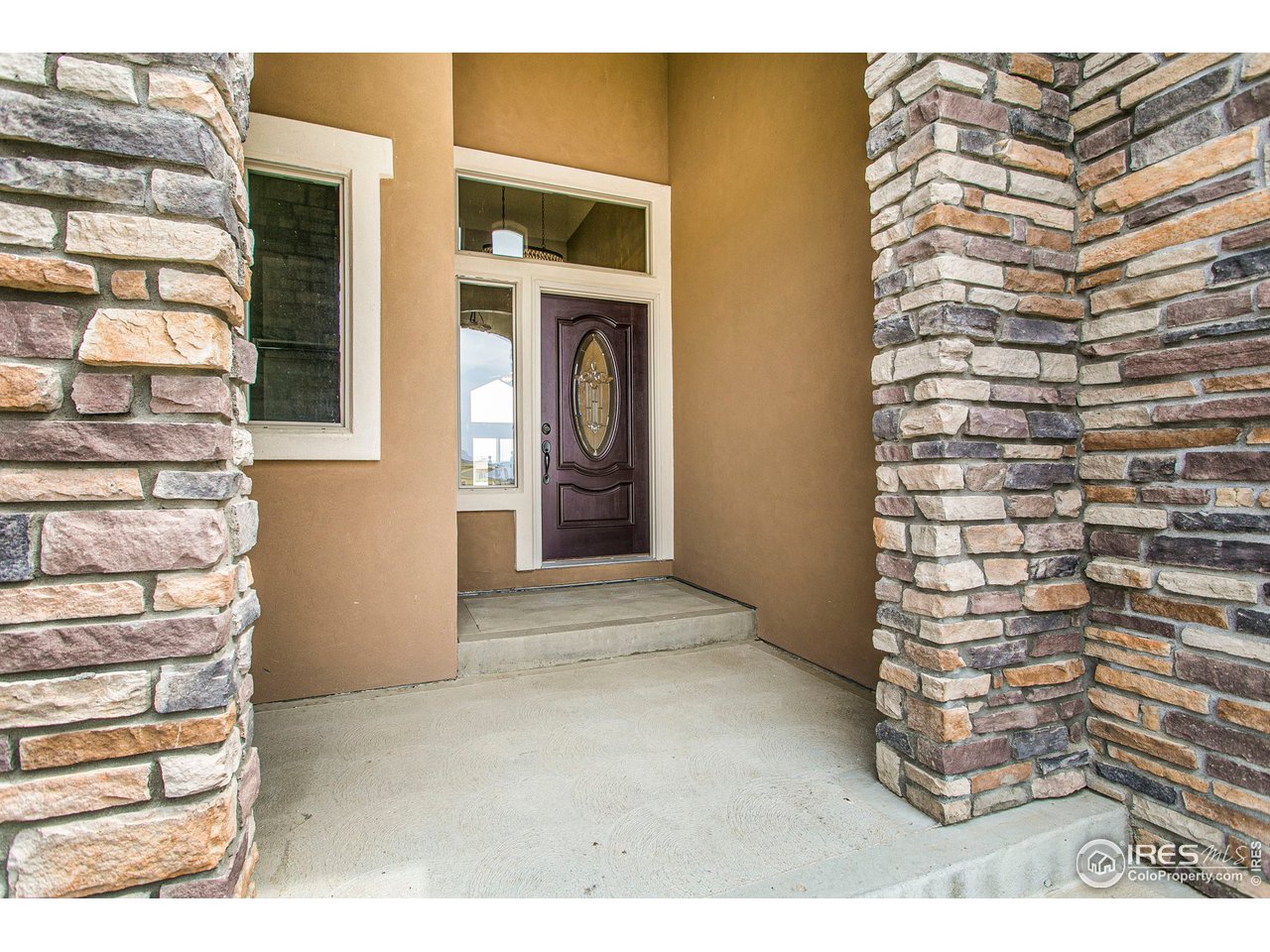 3202 Timeless Circle Berthoud, CO 80513 - Photo 4 of 40 a view of an entryway of the house