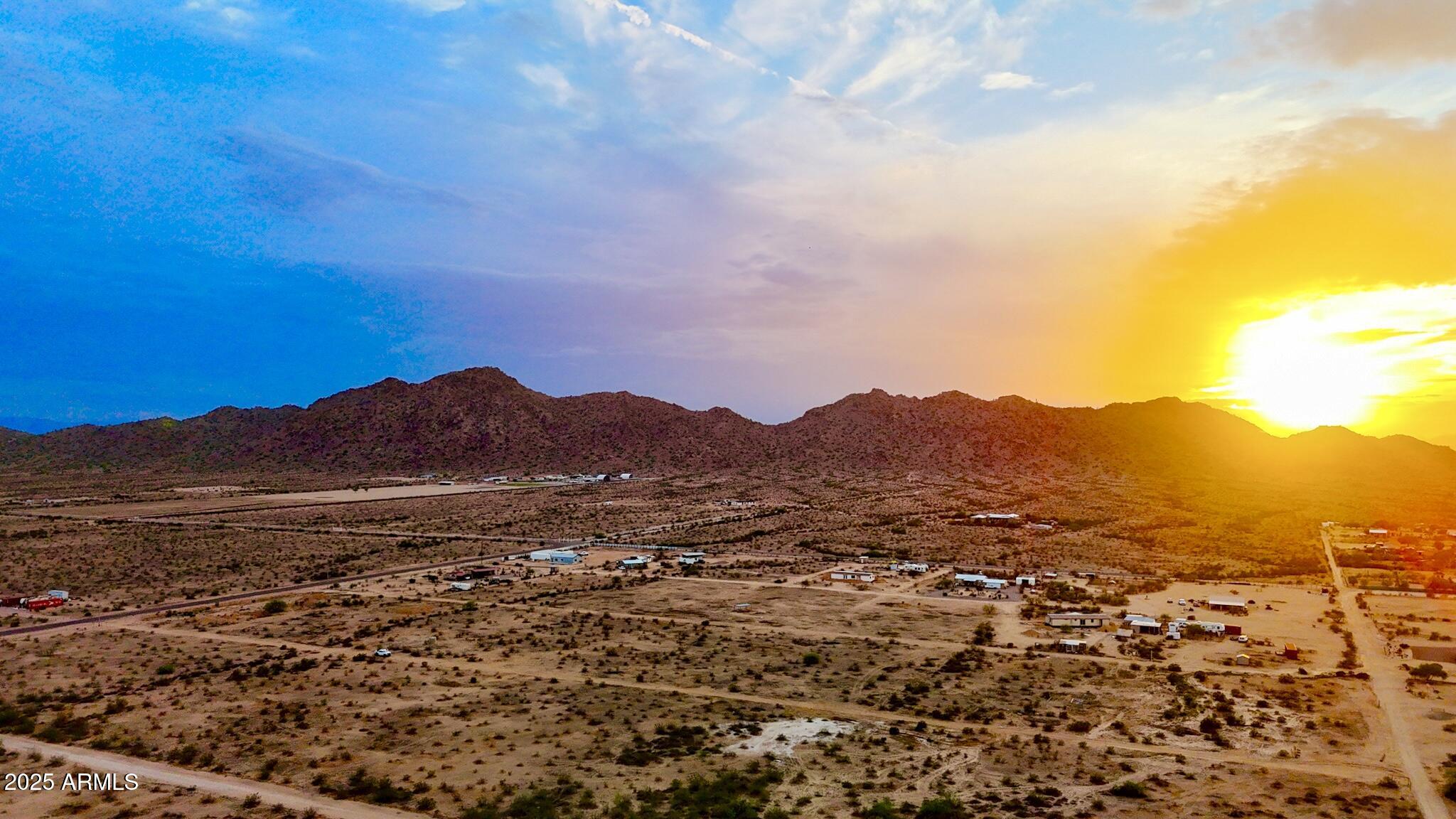 55610 West McDavid Road Maricopa, AZ 85139 - Photo 4 of 25 dji_fly_20250917_181946_0783_17581643426