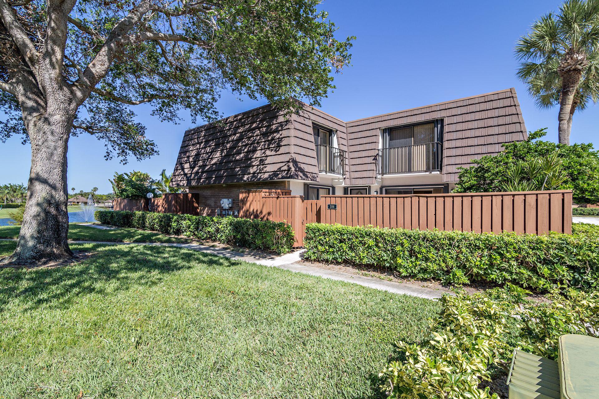 2016 20th Court, Unit 63D Jupiter, FL 33477 - Photo 1 of 31 FRONT OF TOWN HOME