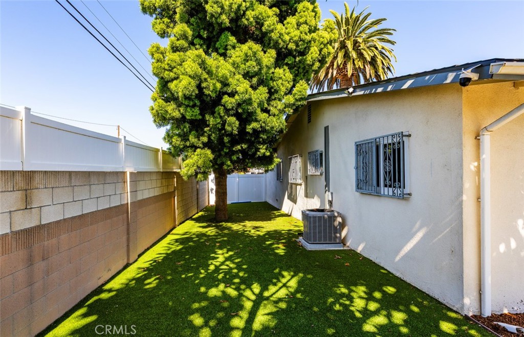 7901 Rhine Drive Huntington Beach, CA 92647 - Photo 14 of 19 a view of a house with a yard