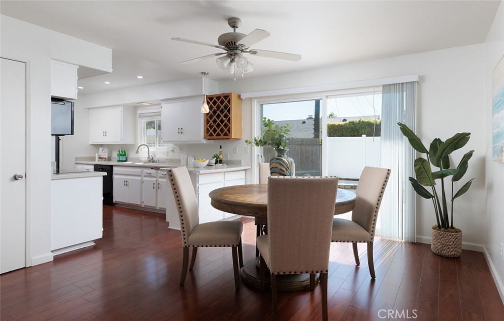 7901 Rhine Drive Huntington Beach, CA 92647 - Photo 5 of 19 a view of a dining room with furniture window and wooden floor