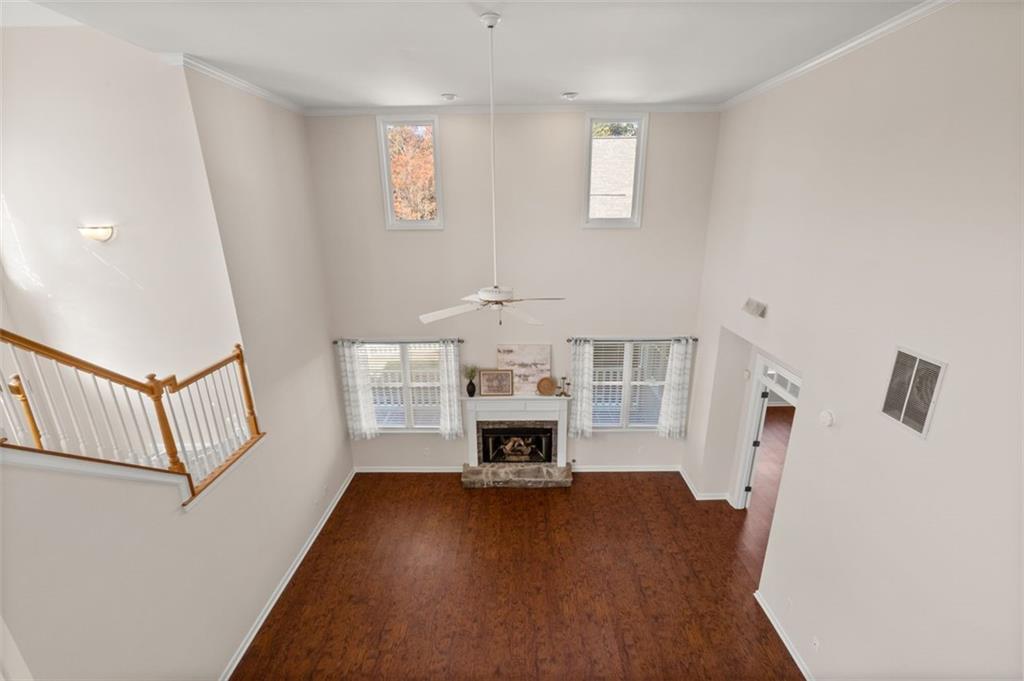 2935 Cobblestone Drive Cumming, GA 30041 - Photo 35 of 53 a living room with furniture and a fireplace