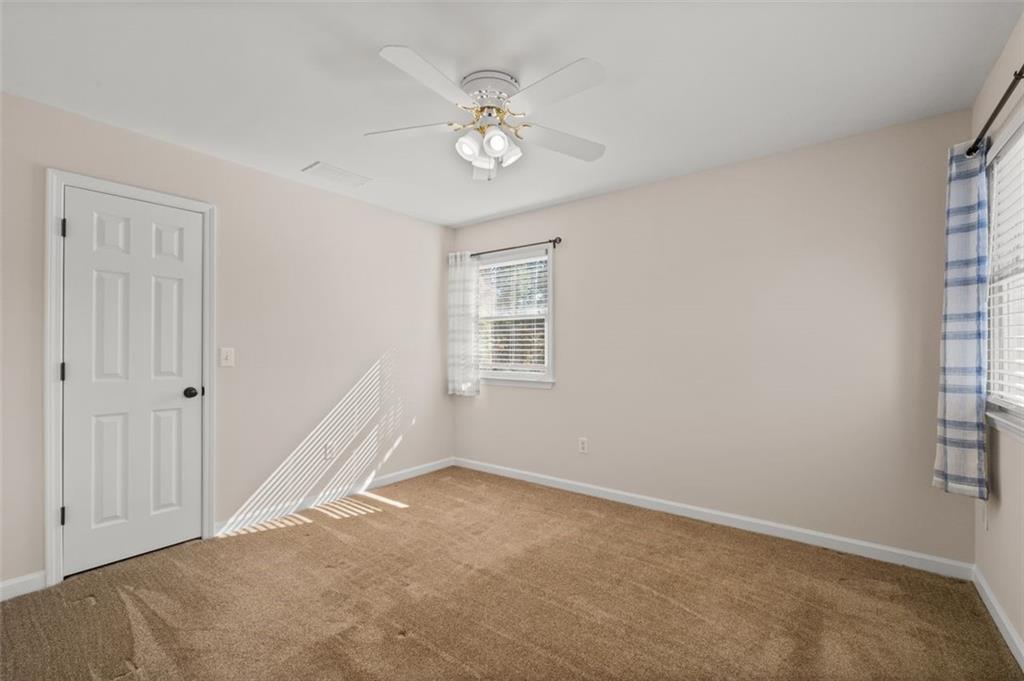 2935 Cobblestone Drive Cumming, GA 30041 - Photo 36 of 53 a view of an empty room with a window