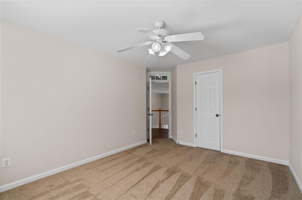 2935 Cobblestone Drive Cumming, GA 30041 - Photo 40 of 53 a view of an empty room with a window