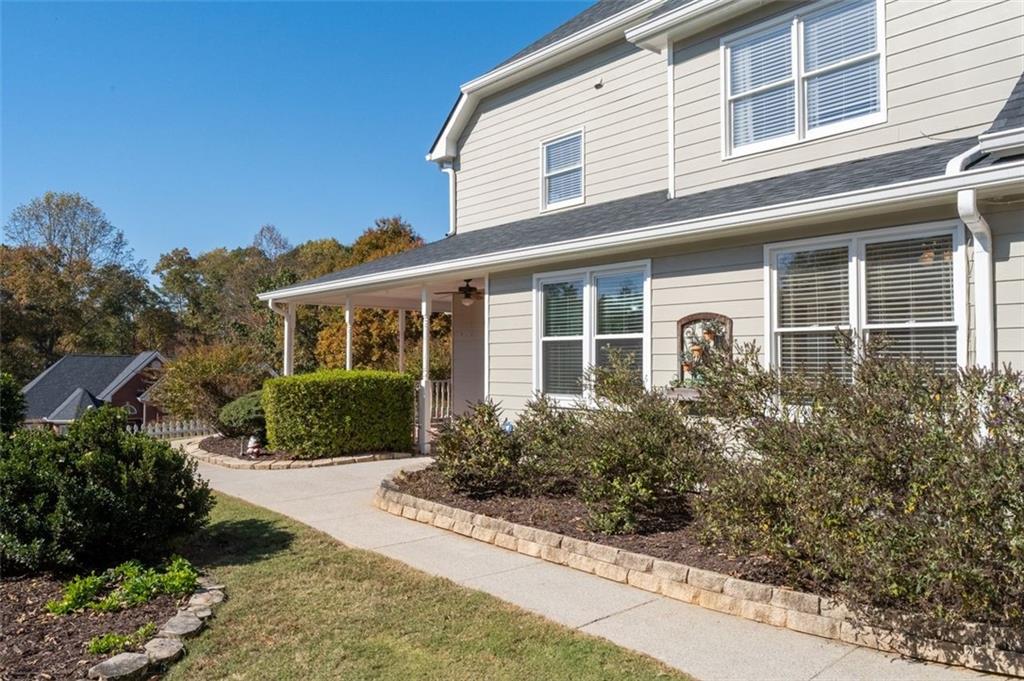 2935 Cobblestone Drive Cumming, GA 30041 - Photo 43 of 53 a front view of a house with a yard