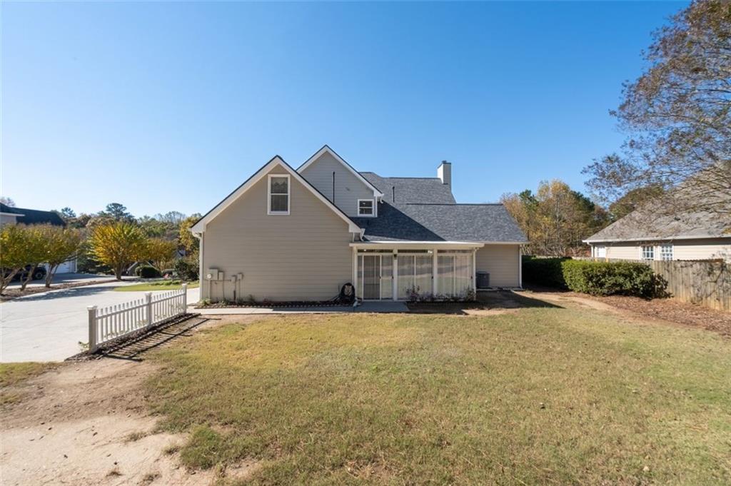 2935 Cobblestone Drive Cumming, GA 30041 - Photo 47 of 53 a view of a house with a yard