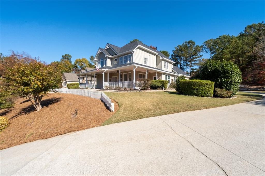 2935 Cobblestone Drive Cumming, GA 30041 - Photo 52 of 53 a view of a house with a outdoor space