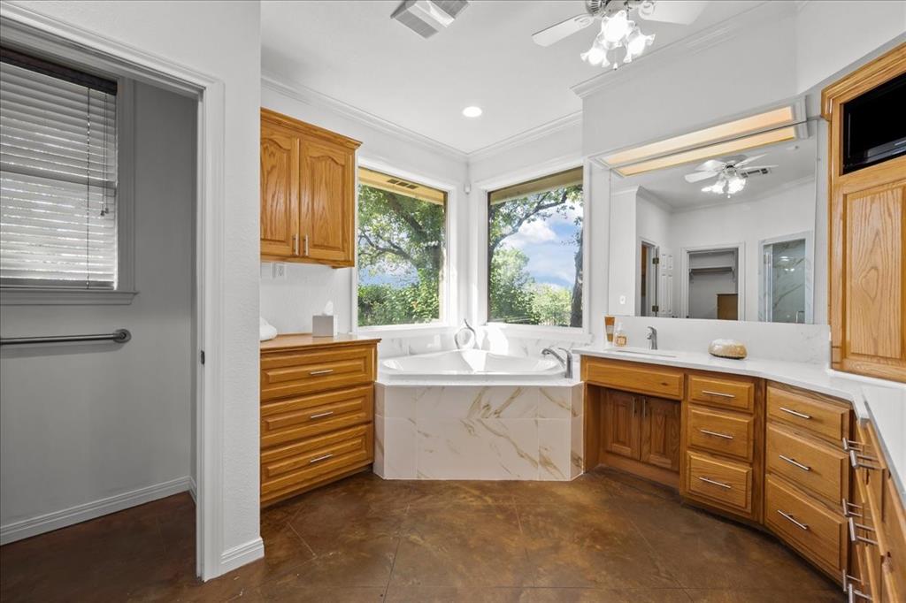 8300 Jonquil Drive Waco, TX 76708 - Photo 22 of 40 a large white kitchen with a large window
